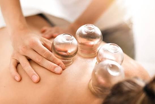 Gliding cupping massage with soothing botanical oil for deep muscle and fascia release
